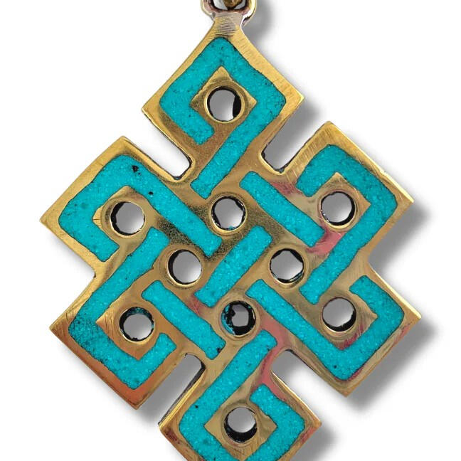 Pendentif doré &quot;Noeud sans fin&quot; Finement ouvragé, il évoque l’interconnexion de toutes choses.